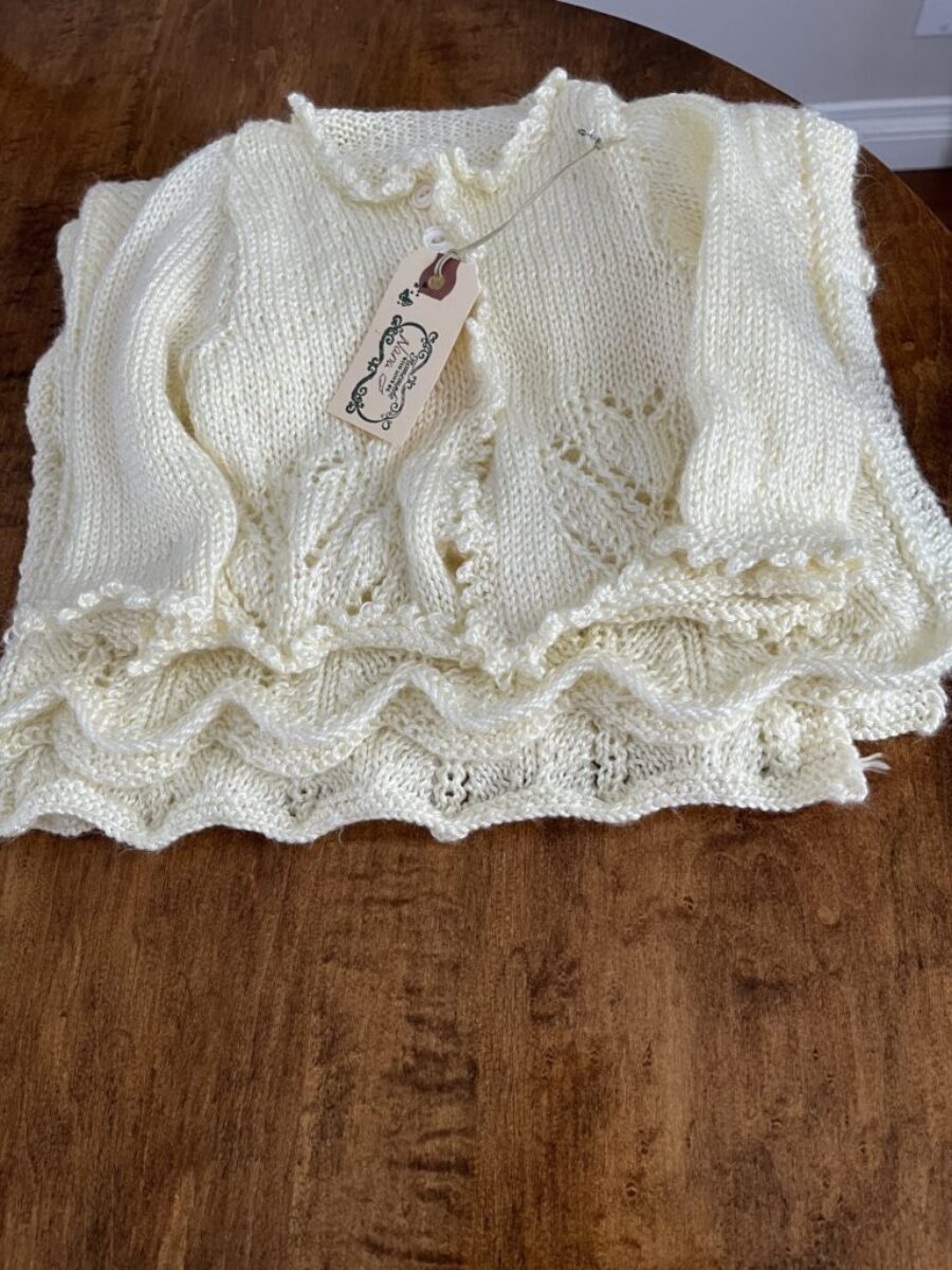 Hand knitted baby blankets and sweaters