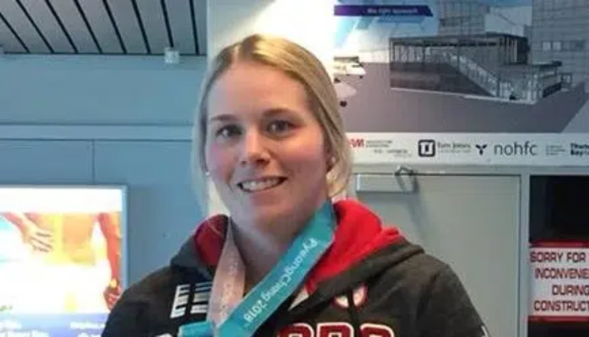 haley-irwin-with-medal-caroline-e1554392845628-1