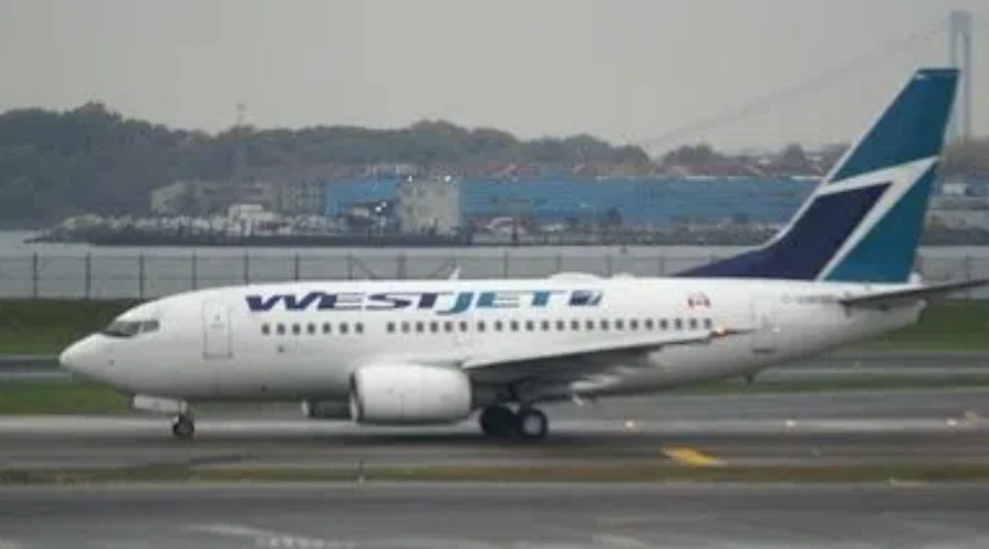 WestJet Cutting Flights And Laying Off Staff