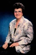 Melanie “Millie” Flamand