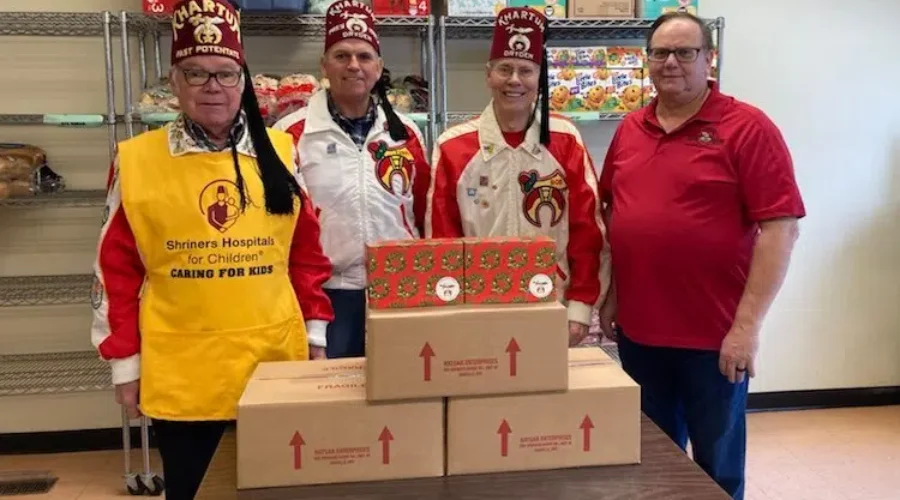 xmascakes-1 Shriner Donation To Support Food Bank