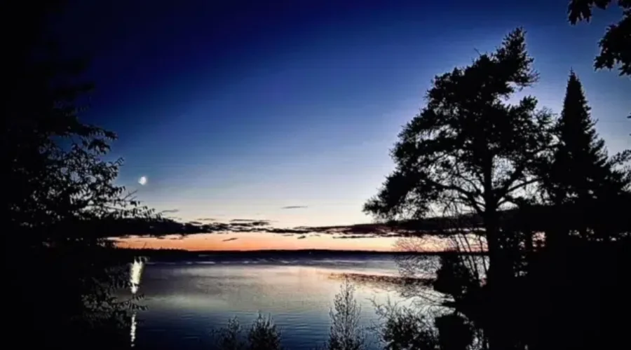 The Moon At Sunset Over Wabigoon Lake
