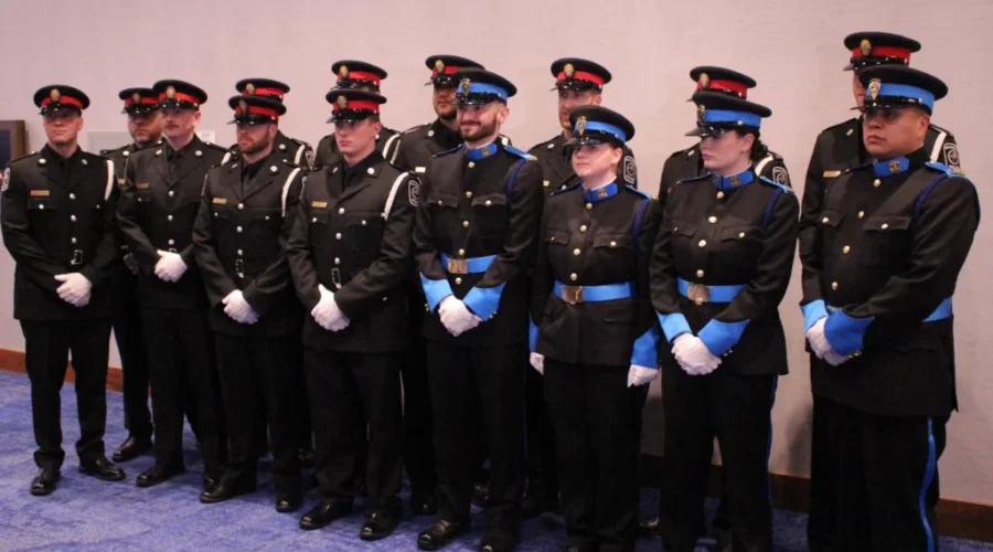 Police constables receive their badges