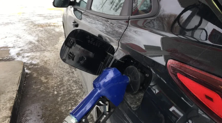 gas-nozzle Carbon Tax only part of reason for high gas prices