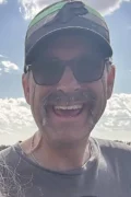 Michael “Mike” De Ridder