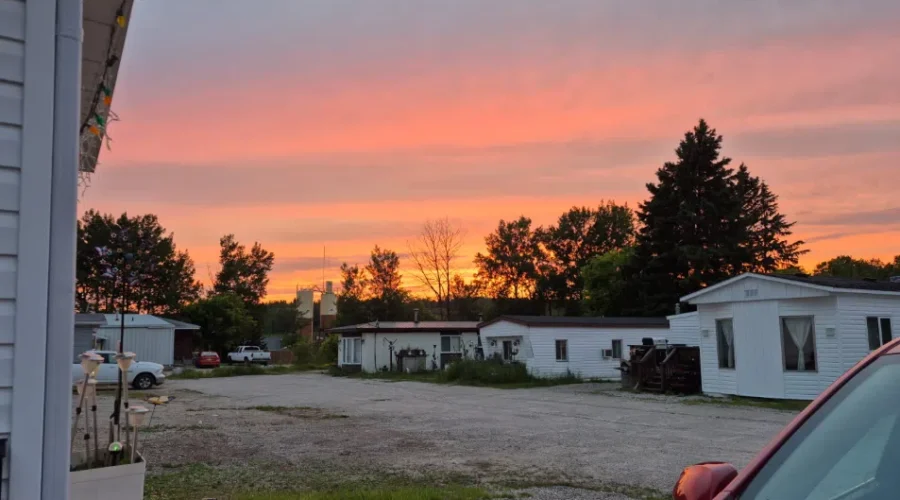 Vibrant Sunrise over Hillcrest Trailer Park
