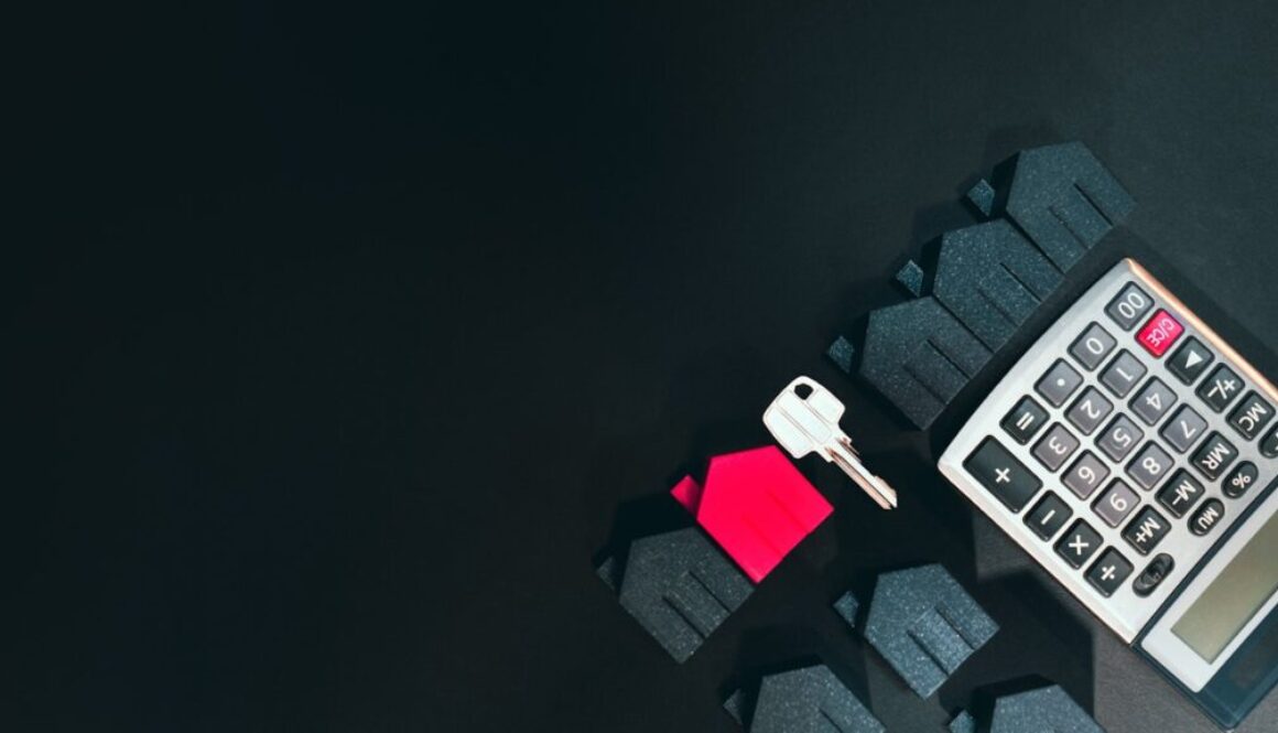 A cell phone sitting on top of a keyboard