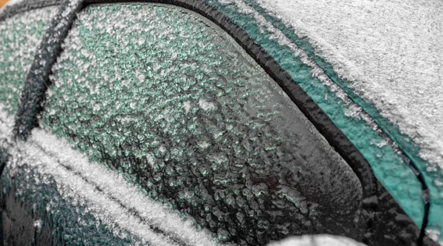 Car covered by icicles from freezing rain in winter. Environment Canada warns freezing rain on the way