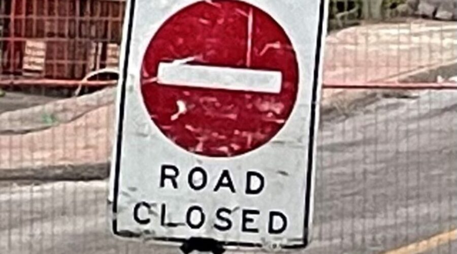 road closed sign Emergency water main repairs in Dryden on Saturday