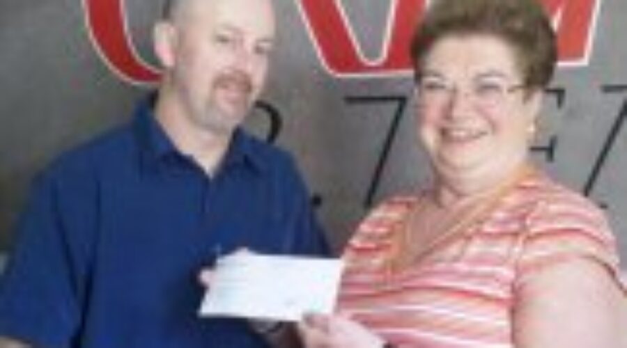 2012-08-22_11-22-55_311 CKDR Makes Donation to DES