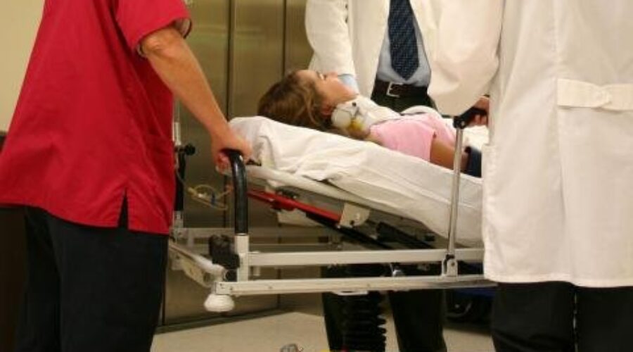Hospital20-20patient20heading20into20emergency20room_1 Health Care Premiums On The Rise