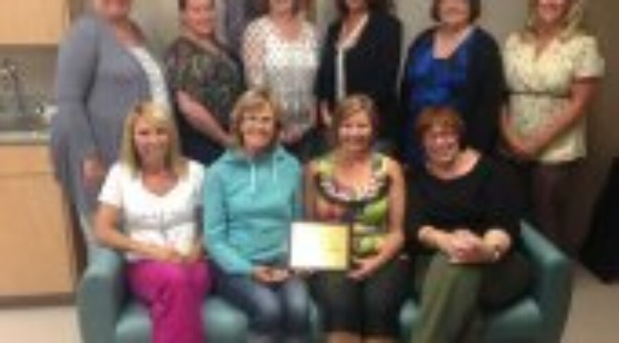 Calendar Girls Donate ‘Setee’ To DRHC