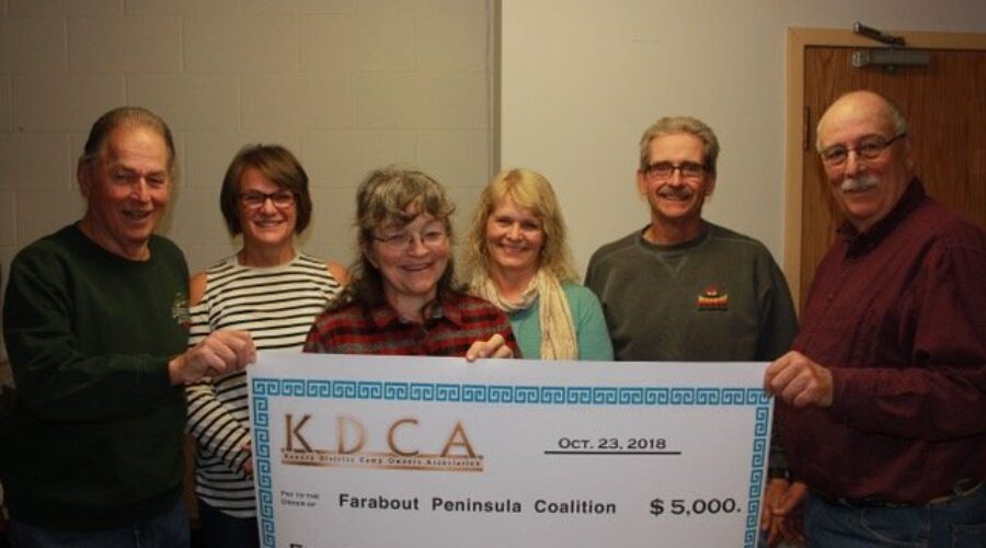 KDCA-TourismFarabout-check-pic Camp Owners Association Make Investment In Protecting Natural Resources