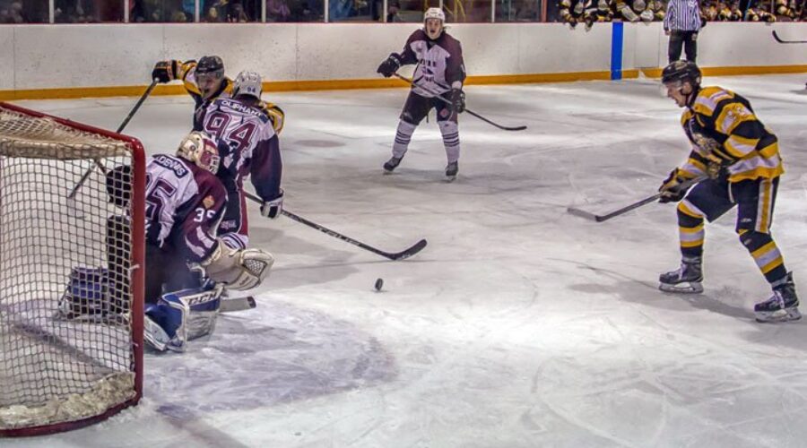 March14-DRY-ERM Ice Dogs Outlast Miners