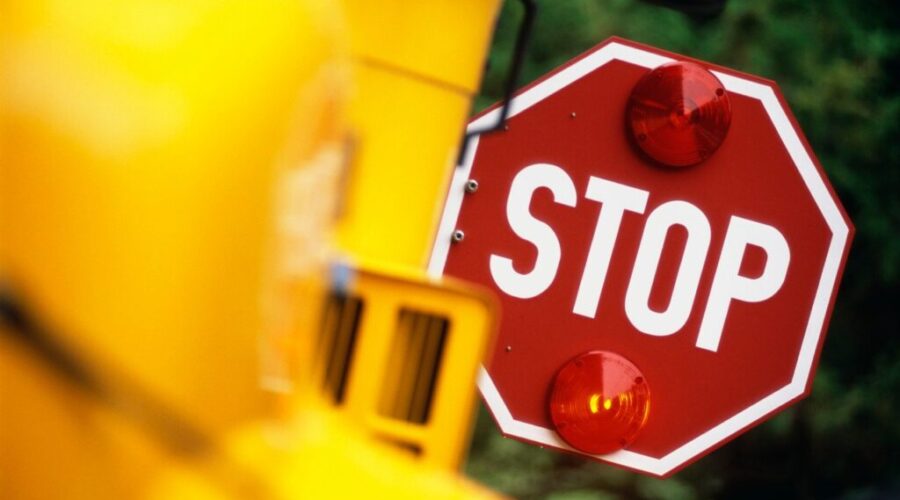 Stop Sign on School Bus Reminder Issued To Stop For School Buses