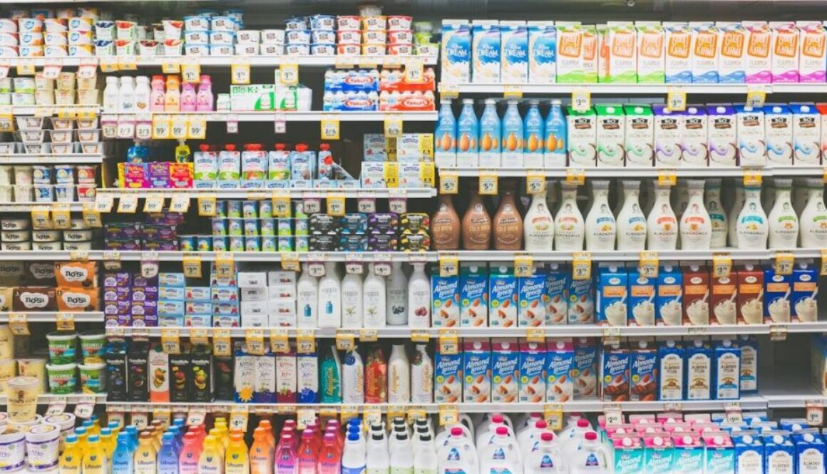 assorted drinks on white commercial refrigerator