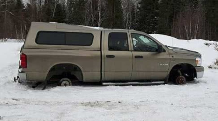 Parked Pick-Up Truck Stripped Of Tires
